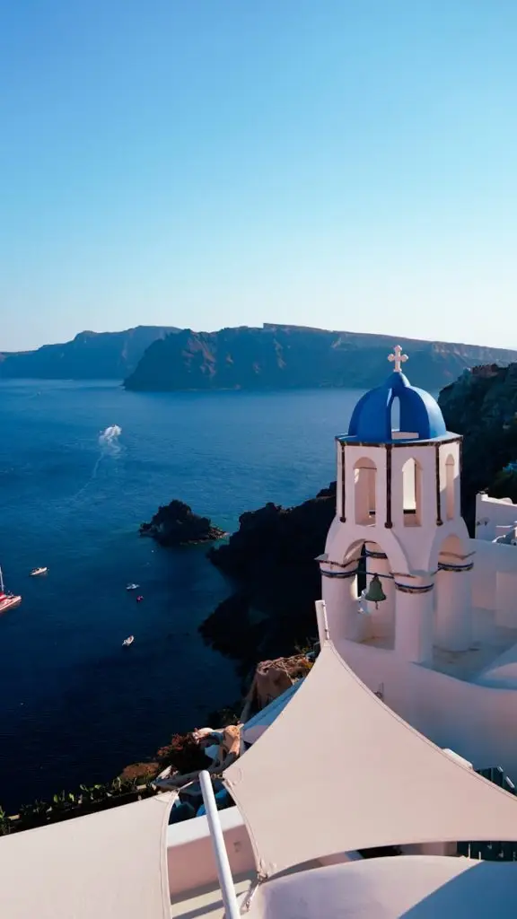 a white building with a blue dome on top of it